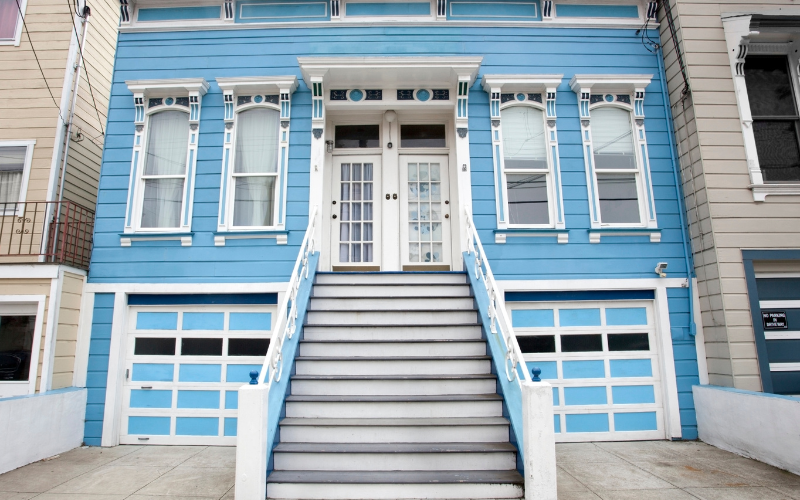 Barbershop interior with styling chairs, mirrors, lighting, and countertop appliances — common sources of electrical and ventilation concerns.